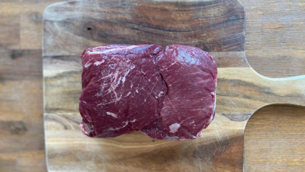 beef cheek on wooden board