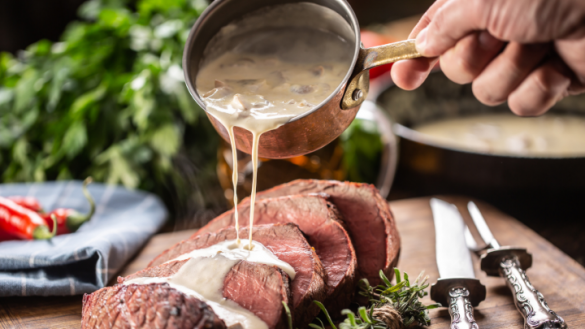 mushroom sauce poured over rib fillet